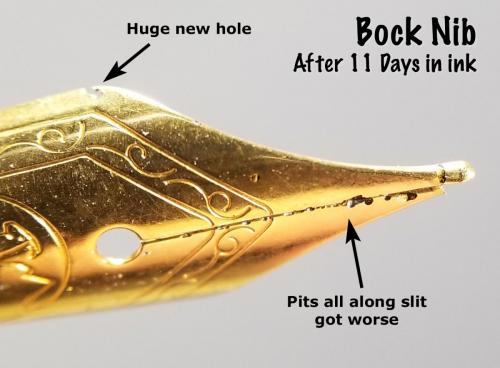 Top view of the Bock nib after 11 days in the Aristotle Iron Gall ink. This view shows the worsening of the pits corroded along the slit. It also shows a large, new hole at the shoulder.