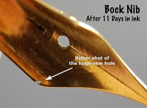 Underside view of the Bock nib after 11 days in the Aristotle Iron Gall ink. This view shows the new large pit/hole eaten into the shoulder of the nib.