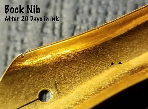 Underside view of the Bock nib after 20 days in the Aristotle Iron Gall ink. This view shows the final state of the holes corroded straight through the nib and the huge pit on the shoulder of the nib.